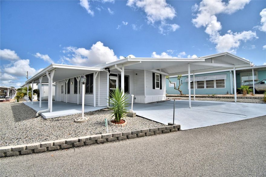 BEAUTIFUL FLORIDA OASIS located in a 55+ GATED community in the heart of CENTRAL FLORIDA and you OWN YOUR LAND. Home offers 1B/1.5B with BONUS ROOM. Open Kitchen with all appliances conveying with a separate dining room. 18x12 Florida Room/Living Room. Hurricane grade windows installed. Shed is equipped with Washer/Dryer and room for storage. Rock yard for low maintenance care while here full-time or seasonal. Concrete COVERED PATIO down the side of the home with Sun Shades if needed. COVERED PARKING for 2 vehicles. COMMUNITY AMENITIES INCLUDE: Solar-Heated POOL, Recreation Hall, Mini Putt Putt Golf, Shuffleboard, Pickle Ball, Bocce Ball and many MORE. Located near restaurants, medical, shopping and major roadways that lead you to FLORIDA ATTRACTIONS and both EAST/WEST COAST BEACHES! Come join the Florida Lifestyle of WEST VIEW RIDGE you will be glad you did. SELLER MOTIVATED.