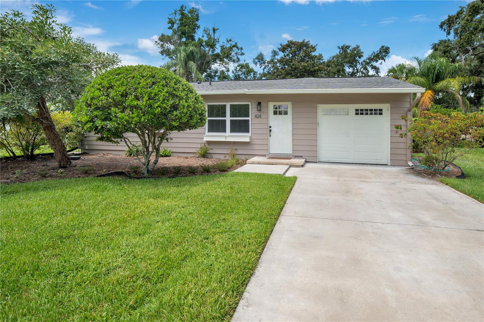 Welcome to this Updated Ranch Style Home Located Just One Mile from the Vibrant Heart of Historic Downtown Sanford. This Thoughtfully Designed Home Features a Desirable Split-Bedroom Floorplan, Offering Both Privacy and Flexibility for Modern Living. Step into the Separate Dining Room upon Entering the Home which Connects to the Spacious Kitchen/Living Combo. The Living Room Looks Out onto an Oversized Screened Patio in Back - An Ideal Space for the Entertaining Friends and Family on Cooler Evenings. The Primary Bedroom is Tucked Away at the Back of Home and Features an EnSuite Bathroom and a Large Walk In Closet with Built-In Storage. The Primary Bathroom Features Dual Sinks and a Walk In Shower. Two Additional Bedrooms and an Updated Hall Bath are Located on the Opposite Side of Home. Both Bedrooms have Closets with Built-In Storage Systems Maximizing Your Storage Needs. A Washer/Dryer is in the Hallway Next to the Hall Bathroom. A One Car Garage and Private Driveway Allows Cars to be Off the Street. The Mayfair/Ft Mellon Area is a Quiet Community Mere Minutes from the Bustling Energy of Historic Downtown Sanford Where You'll Discover Restaurants, Galleries, Breweries and the Marina. The Home is Conveniently Located within Close Proximity to Major Highways, Grocery Stores and Less than an Hour to the Beach. Don't Miss Out on this Renovated Gem!