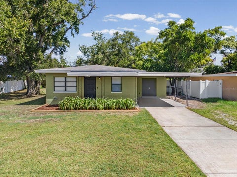 Photo of 7002 Thrasher Drive, Tampa, FL 33610 (MLS # TB8543735)
