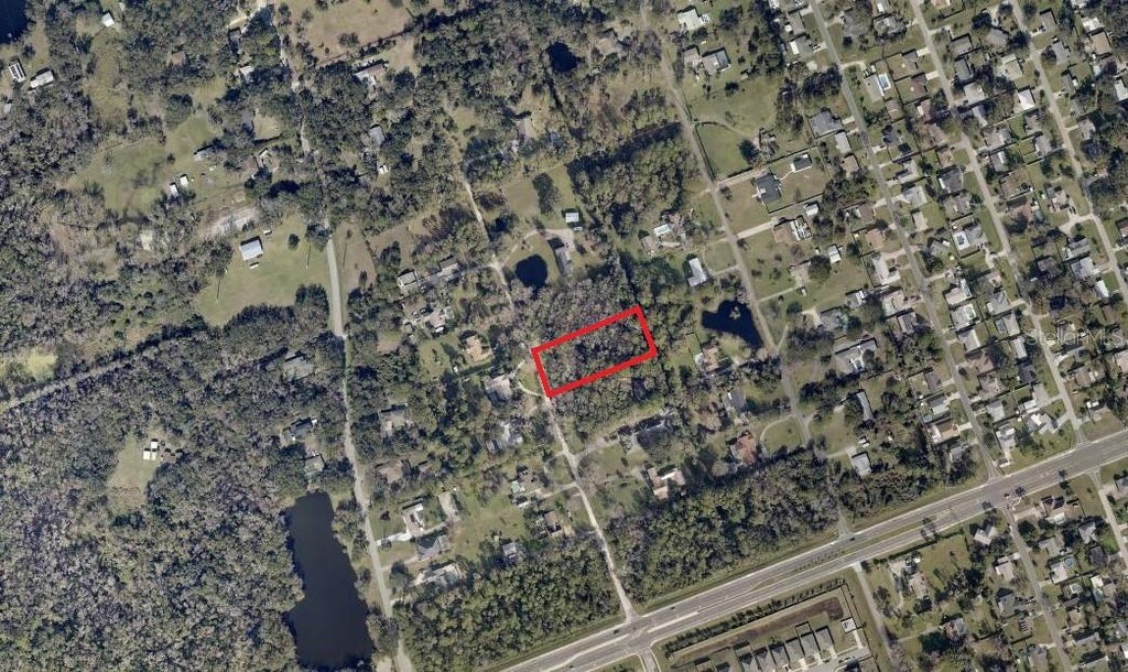Photo of 1785 Maplewood Drive, Edgewater, FL 32132 (MLS # NS1089246)