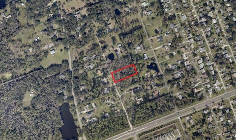 Photo of 1785 Maplewood Drive, Edgewater, FL 32132 (MLS # NS1089246)