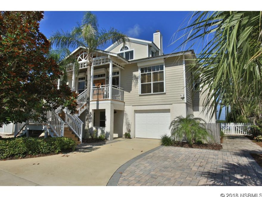 Truly one of a kind!! Custom designed & Hickson built River home one block to the beach. Magnificent view from the moment you walk in the front door. Superb home for large family gatherings or sophisticated entertaining. Gourmet kitchen with 48" built in frig, 6 burner gas Dacor stove, Dacor oven, Thermador warming oven, Kitchenaid under counter ice machine, new Kitchenaid DW, plus cabinets galore. Or if you prefer, enjoy cooking in your outdoor kitchen overlooking the custom salt pool, connected to the upper level dock, with boat and floating dock underneath. Launch the kayaks right from the dock. Hardwood floors throughout main floor. Master suite with door to covered porch, shower while watching boats go by on the river. Huge deck and screen porch back of the house, with vinyl sliding doors to keep rain out, or open for that magnificent view. No neighbors across the river, just nature. Unique deep lot with circular drive from Peninsula out to Sapphire Drive; also is corner river lot allowing for 2 sides of riverfront, with wonderful night views of downtown to the south, and the light house to the north. Downstairs are two huge garages with one having garage door on the back for easy access. Den can be used as separate apartment with den, wet bar, BR and bath. This opens into Florida room with 4 sets of sliders out to pool and yard. Detached in-law cottage with LR, DR, kitchen, BR and bath. Or use as guest cottage. Beautiful peaceful grounds, full house generator & water treatment system, central vac, workshop area in large garage, Attached air compressor with spring loaded pull out cables. Stair chair lift to main level for those heavy items, or someone needing assistance with stairs. Hurricane shutters or impact glass all around. 2 RV pads with 50 Amp service. One mile to the Inlet and disappearing Island. This home has ALL the toys for everyone in the family. This is your dream home! ;Water: City