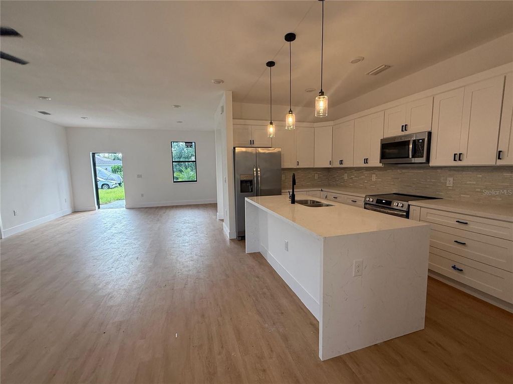 Photo of 5486 Riley Lane, Port Charlotte, FL 33981 (MLS # O6387886)