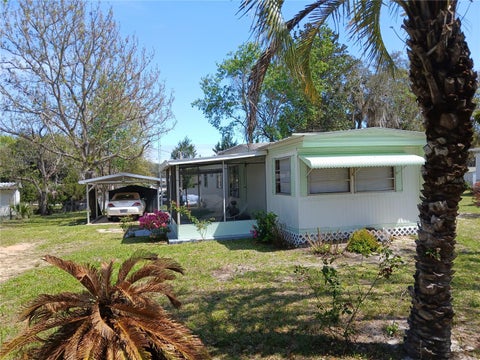 Photo of 1525 SE 187th Avenue, Silver Springs, FL 34488 (MLS # OM721592)