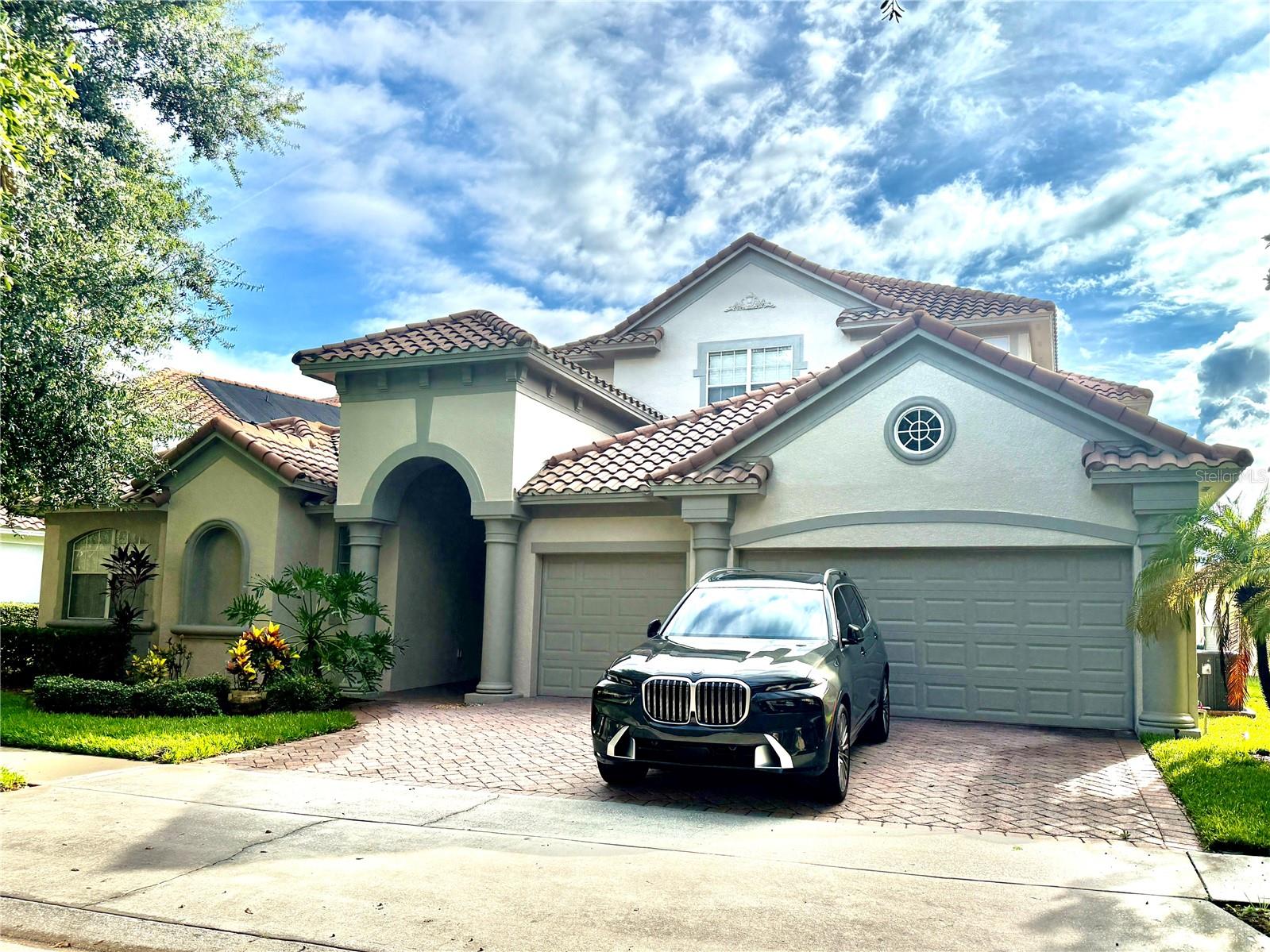 Beautiful Mediterranean style courtyard home in the award-winning Providence, a gated golf and country club community. Conveniently located near attractions, restaurants, and newly developed shopping.
This home offers 4 bedrooms and 3.5 baths in the main house, plus an attached private entry in-law suite with its own bathroom. The impressive double-door entry opens to a spacious courtyard and pool, complete with lanai.
Inside, retractable glass doors lead to the large family room with volume ceilings. The gourmet kitchen features 42” custom cabinets, granite countertops, tile backsplash, stainless steel appliances (including refrigerator and dishwasher), and a breakfast nook. This home includes a formal living and dining room with water views.
The first-floor master suite has an oversized bath with dual vanities, spa tub, large shower, and walk-in closet. Upstairs are two bedrooms, a large bonus/3rd bedroom, and a versatile loft suitable for a game room, media room, or office.
Additional highlights include a 3-car garage, paver driveway, tile roof, crown moldings, security system, and an energy-efficient design. A dedicated well pump for irrigation significantly reduces water costs and keeps landscaping lush year-round.
Community amenities include a championship golf course, multiple pools, tennis courts, playground, restaurant, and fitness center. Located on a quiet cul-de-sac. **More pictures to come**