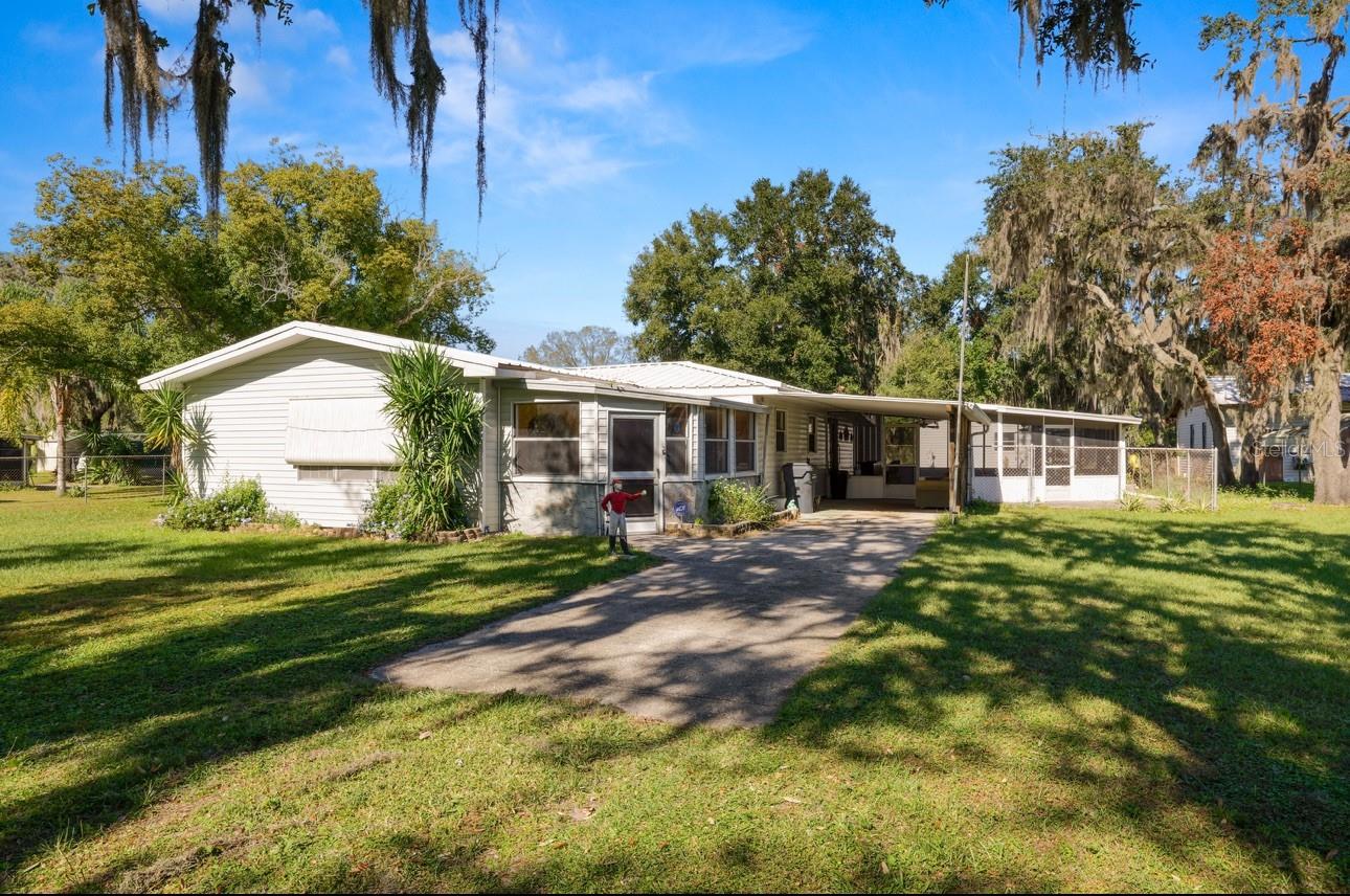 Welcome to 3347 Youngway Dr, a charming 3-bedroom, 1-bath home situated on almost a half-acre along a quiet dead-end street in North Lakeland. This home also features a bonus room, accessed through a bedroom, that could serve as a 4th bedroom, office, or flex space. There’s plenty of room to add a second bathroom if needed, making it a great fit for larger families. Enjoy the spacious screened-in patio, perfect for peaceful mornings or entertaining guests. Recent updates include brand new luxury vinyl plank flooring, fresh interior paint, new ceiling fans, a brand new hot water heater, a new refrigerator, and a water filtration system installed in June 2025. The home also has a durable metal roof that has had no known issues. The adjacent property is also for sale (MLS# L4954716) and offers nearly half an acre with a detached 1,152 sq ft shop and two carports—ideal for extra storage, workspace, or a multi-property setup.
Don’t miss your chance to make this home yours. Schedule your showing today!