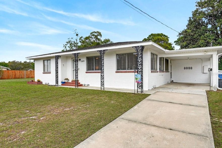 Live just blocks from the Blue Lake boat ramp on a spacious corner lot! This well-maintained home offers major system updates—including a newer roof, HVAC, and whole-home water filtration system—so you can enjoy Florida living with confidence and convenience.

Welcome to 1403 Sharon Drive, a property that blends location, upgrades, and lifestyle. This home offers quick and easy access to boating, fishing, and outdoor recreation, making it a perfect fit for buyers who want to enjoy the Florida lake lifestyle.

Major home system upgrades provide peace of mind for years to come. The property features a salt, charcoal, and reverse osmosis whole-home water filtration system with a new pressure tank installed October 17, 2022, along with a new water pump installed August 16, 2025. Additional key updates include a roof replaced in 2019, HVAC system installed in 2021, and a water heater installed in 2018, making this a move-in ready home with important mechanical improvements already completed.

The spacious corner lot offers extra yard space, privacy, and flexibility for outdoor living, gardening, or additional storage. With its proximity to Blue Lake, nearby boat ramp access, and major system upgrades, this property presents a fantastic opportunity for buyers seeking lake-access living with modern updates.

Schedule your showing today and experience the convenience of living just minutes from Blue Lake.