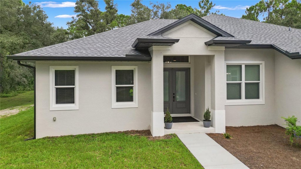 Photo of 400 S Moon Drive, Venice, FL 34292 (MLS # A4705886)