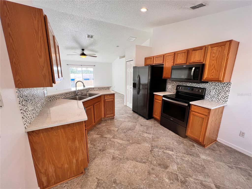 Photo of 3344 Courtland Boulevard, Deltona, FL 32738 (MLS # O6416407)