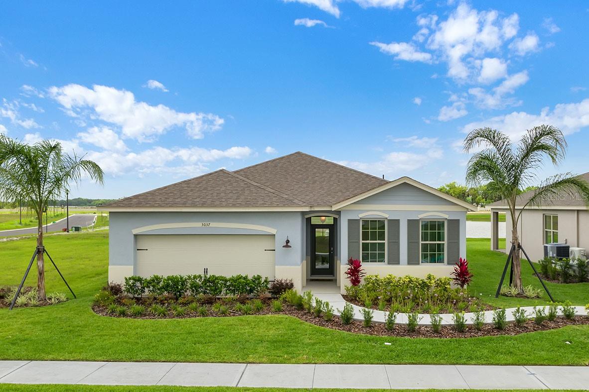 Under Construction. "The Delray is a one-story floorplan featured in our Archers Mill. Inside this 4-bedroom, 2-bathroom home, you’ll find 2,034 square feet of comfortable living.
This home offers a two-car garage and covered porch in the rear of the home for relaxing outdoor living. This amazing one-story home caters to you and features all concrete block construction.
The kitchen overlooks the dining and great room, while having a view to the covered oversized lanai outside. The well-appointed kitchen features an island with bar seating, plentiful cabinet with beautiful quartz countertops and stainless steel appliances, making entertaining a breeze.
Bedroom one, located at the back of the house for privacy, has an en suite bathroom with double vanity and two spacious walk-in closets providing ample space for storage. Three additional guest bedrooms and one full bath are located at the front of the home.
Like all homes in Archers Mill, the Delray includes a Home is Connected smart home technology package which allows you to control your home with your smart device while near or away.
*Photos are of similar model but not that of exact house. Pictures, photographs, colors, features, and sizes are for illustration purposes only and will vary from the homes as built. Home and community information including pricing, included features, terms, availability and amenities are subject to change and prior sale at any time without notice or obligation. Please note that no representations or warranties are made regarding school districts or school assignments; you should conduct your own investigation regarding current and future schools and school boundaries.*