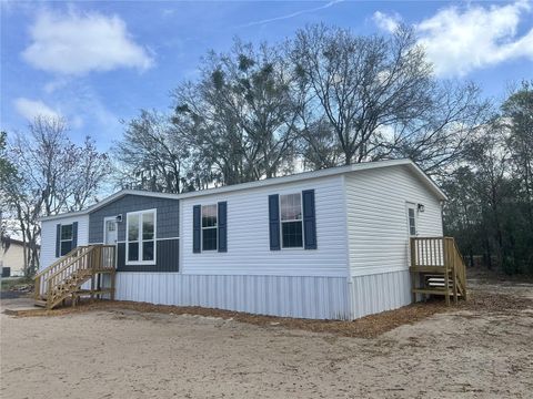 Photo of 1089 Aspen Street, Bunnell, FL 32110 (MLS # FC312771)