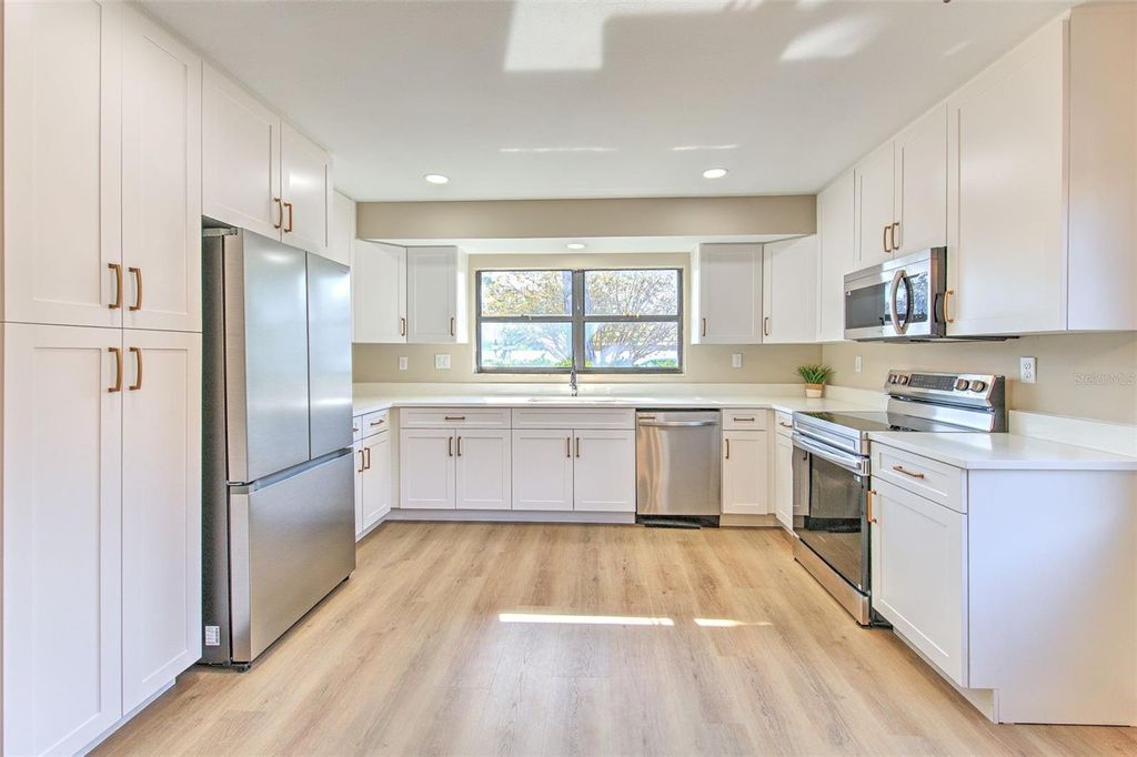 Photo of 2745 Whispering Drive N, Largo, FL 33771 (MLS # TB8452767)