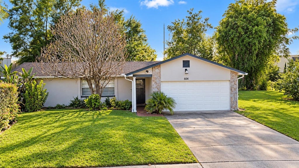 Photo of 604 Riverwoods Circle, Orlando, FL 32825 (MLS # O6446016)
