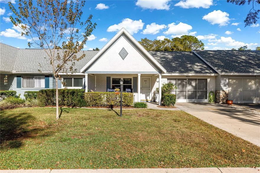 EVERYTHING HAS BEEN TASTEFULLY UPDATED IN THIS POPULAR PHILADELPHIAN VILLA! Located in On Top of the World, 55+ gated golf community in SW Ocala FL. Roof 2024, HVAC 2015, Windows 2016, Enclosed Lanai/FL Room & Windows 2018, 2015 Water Heater, 2016 BOTH Baths & Kitchen Remodeled, 2016 LVP in Bedroom, 2025 State of the Art Belt Drive Garage Door Opener! This villa has 2 bedrooms, 2 baths (BOTH UPDATED w/step-in showers w/custom tile surround & glass doors, comfort height toilets, and updated vanity & lights & exhaust fans w/night lights), 1.5 car garage (more than ample space for car & golf cart), 18” tile recently cleaned and sealed, every. Step inside the Great Room and notice the bedrooms to the left, and eat-in kitchen and finished FL room to the right. Custom lighting/fans throughout, including recessed lights. The guest bedroom is in the front left with large closet. Currently there are two twin beds together – a KING size bed easily fits. The RENOVATED hall/guest bath and linen closet divide the bedrooms. The primary bedroom is in the back of the home for privacy, included is a spacious walk-in closet with custom racks, and RENOVATED en suite bath. The kitchen cabinets were COMPLETELY replaced with high end cabinetry. This eat-in kitchen includes stainless appliances (convection oven), custom lighting, and access to the FL Room and garage. The finished FL Room offers additional Flex space with solar shades & extra electrical outlets. Step out to the GIGANTIC concrete patio – perfect for outside living! The garage includes ample storage cabinets, TOP OF THE LINE WHIRLPOOL FRONT LOAD WASHER & DRYER, laundry sink, drop down steps to the attic for more storage & upgraded insulation in attic. Located on a beautiful tree lined street, close to the OTOW community bus stop and nice park setting. Furniture (most from Kanes, mattresses are Temper Pedic & Serta) and 2021 Evolution Golf Cart are available to purchase outside the purchase of the villa - TURN-KEY OPPORTUNITY! The monthly HOA fee includes Basic Spectrum Cable, irrigation water, roof repair, exterior painting every seven years, exterior maintenance and insurance, landscaping, trash & recycling, 24/7 monitored gates and what seems like endless amenities; three pools (2 outside & 1 inside & another under construction), two state of the art fitness centers, pickleball (uncovered & covered), billiards, archery range, corn hole, bocce ball, tennis, shuffleboard, horse shoes, remote control flying field and race cars, 175+ clubs, woodworking shop (extra fee), library, and much, much more! A golf cart community with access to several shopping centers. Centrally located 20 minutes from the World Equestrian Center, easy drive to 4 cruise ports and/or airports, and within a close proximity to entertainment complexes in Orlando, Tampa, and Gainesville.