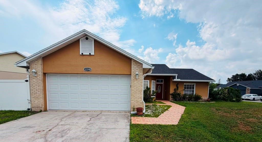 Photo of 12040 Blackheath Circle, Orlando, FL 32837 (MLS # O6430488)