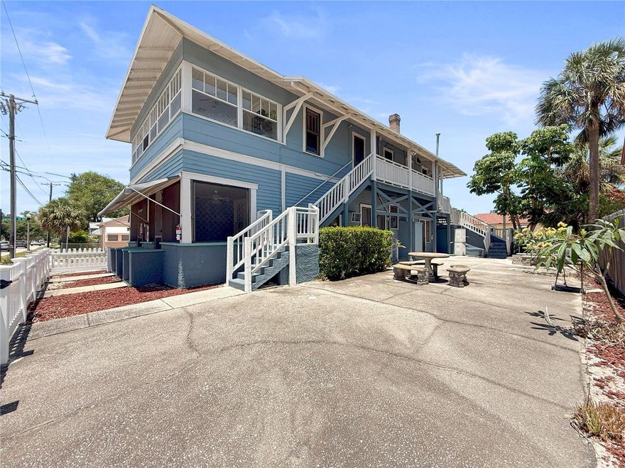 Charming 5-Unit Historic Uptown Multifamily – Walkable, Updated & Designed for Strong Rental Demand.

The Dartmoor House presents a rare opportunity to acquire a beautifully preserved 1920s multifamily asset in the heart of Historic Uptown, just steps from Downtown St. Petersburg. In a high and dry No Flood Zone location, this legal five-unit building combines classic architectural character with updated systems, simple management, and strong renter appeal in one of the city’s most desirable walkable corridors.

Each residence features a private entry, hardwood and tile flooring, high ceilings, ceiling fans, and abundant natural light. Every unit offers its own outdoor area - from screened porches to covered patios - and the shared, fully fenced courtyard creates an inviting communal space that enhances tenant satisfaction and retention. Parking is a valuable advantage in this neighborhood, with each unit assigned one off-street space in the rear gravel lot.

From an investment standpoint, the property is structured for ease of management. Electric service is separately metered for all five units, four units reimburse a proportional share of the master-metered water, and natural gas, paid by the owner, supports a single gas water heater serving the building. HVAC setups include a mix of window/wall A/C units for Units 1–3 and central A/C systems for Units 4–5. Major improvements include updated electrical, 2023 gas water heater, 2024 central A/C system for Unit 4, and a transferable drywood termite warranty. The roof was replaced in 2005 and remains in solid condition. Value add possibilities remain for an investor seeking further upside through strategic improvements.

The location further strengthens the investment profile. Just one block from Starbucks and moments from downtown’s restaurants, museums, breweries, theaters, the St. Pete Pier, Beach Drive, and waterfront parks, the property sits in a prime demand generator for steady rental interest. Crescent Lake Park is nearby, offering walking trails, recreation, and tennis courts, with quick access to I-275 and award-winning Gulf beaches less than 10 miles away.

With its historic charm, updated systems, walkable lifestyle, High and Dry No Flood Zone location, and consistently strong rental demand, The Dartmoor House offers investors a compelling opportunity to own a stabilized, high-appeal asset in one of St. Petersburg’s most cherished neighborhoods, along with meaningful value add potential.