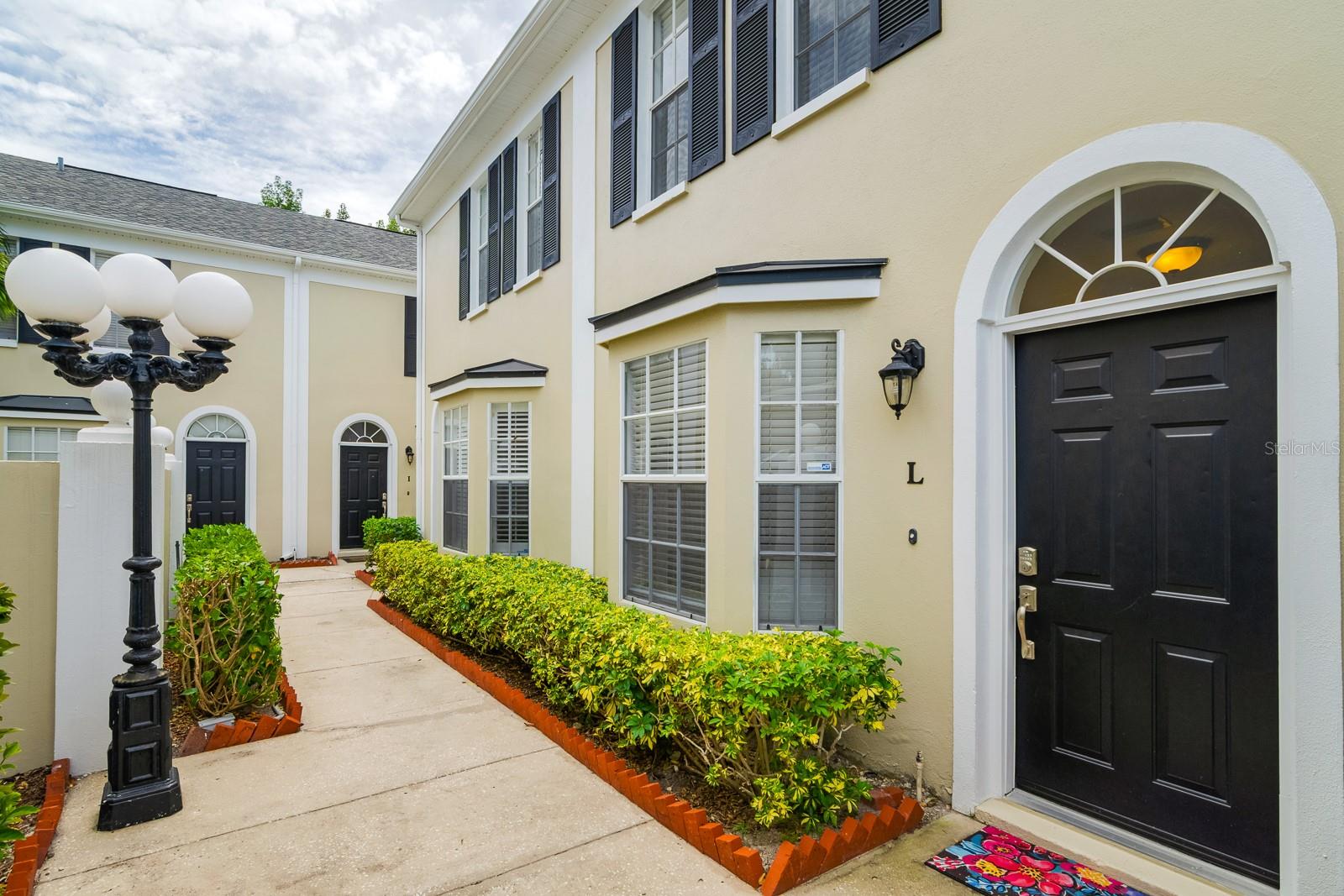 One or more photo(s) has been virtually staged. Here’s your chance to own in one of South Tampa’s most sought-after neighborhoods, located within a top-rated school district! This 2-bedroom, 2.5-bath end-unit townhome offers generous room sizes, with each bedroom featuring its own en-suite bath. Step inside to find an open living and dining area with tile flooring downstairs and engineered wood flooring upstairs—no carpet in sight. The living room overlooks a private patio, perfect for morning coffee or evening relaxation. Additional highlights include in-unit laundry, a nicely landscaped courtyard entrance, new HVAC and Water Heater, and one assigned covered parking space w/ample guest parking along the perimeter of the community. This well-maintained, security-gated neighborhood offers the ultimate in convenience—just around the corner from Hyde Park Village’s shops, restaurants, and walk-able coffee shops. Downtown Tampa, Water Street, Bayshore Boulevard, the University of Tampa and endless sports and entertainment options are only minutes away. Whether you’re a first-time buyer, young professional, or simply looking for a low-maintenance home in the heart of the city, this property is a must-see!