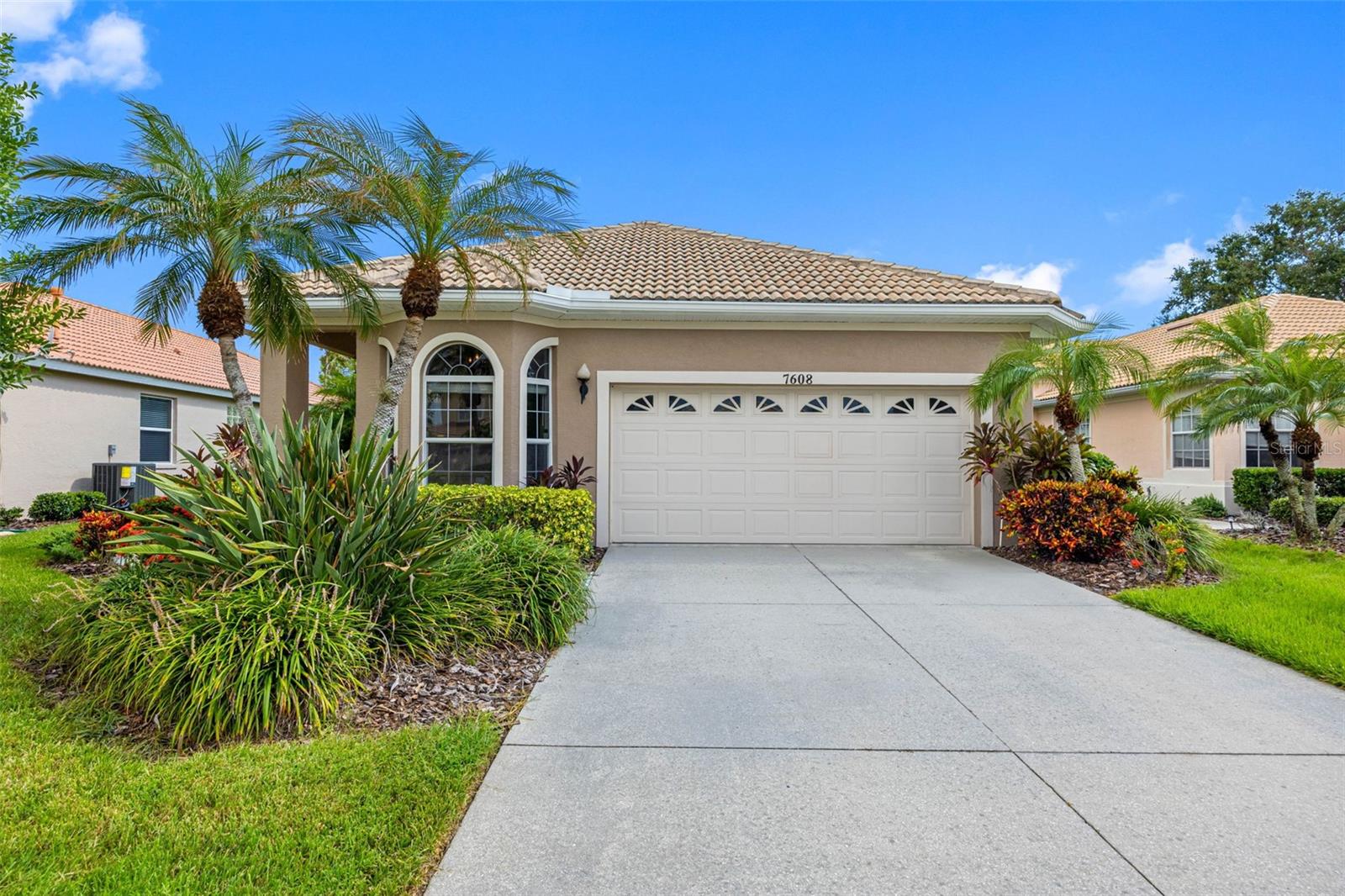 Located in the highly desirable Tara Preserve community, this maintenance-free 3BD/2BA home is designed for both comfort and style. The highlight is your own private heated pool and serene outdoor retreat—perfect for morning swims, entertaining, or simply unwinding in the Florida sunshine. Inside, soaring ceilings and abundant natural light create an airy, open feel. A double-sided fireplace adds warmth and character, while the open floor plan effortlessly connects the kitchen, dining, and living areas, making it ideal for everyday living and gatherings alike. Beyond your doorstep, enjoy a wealth of community amenities including a pool, tennis, pickleball, golf, and fitness center. With lawn care included in the HOA dues, you’ll have more time to enjoy the lifestyle you deserve. Just minutes from shopping, dining, and recreation, this home strikes the perfect balance between relaxation and activity in one of Bradenton’s most sought-after neighborhoods.