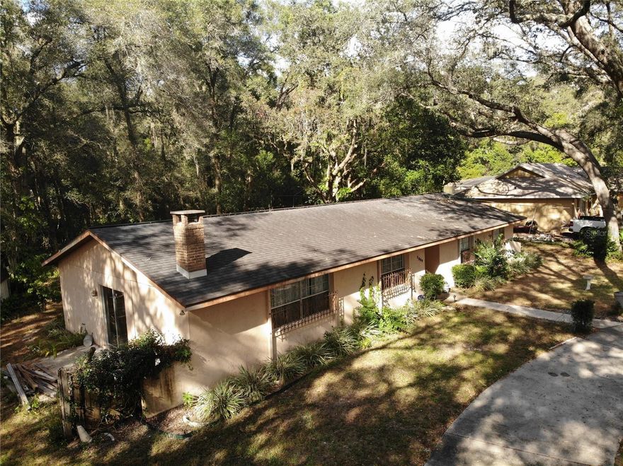 TO SETTLE ESTATE. Four bedroom home in need of renovation. Almost 2000 feet under air with a newer roof. Circular drive and deep pie-shaped lot are appealing features, as well as a cozy location a mere five minutes from downtown. Accepting cash offers and owners are motivated to convey this portion of the estate so feel free to make an offer.