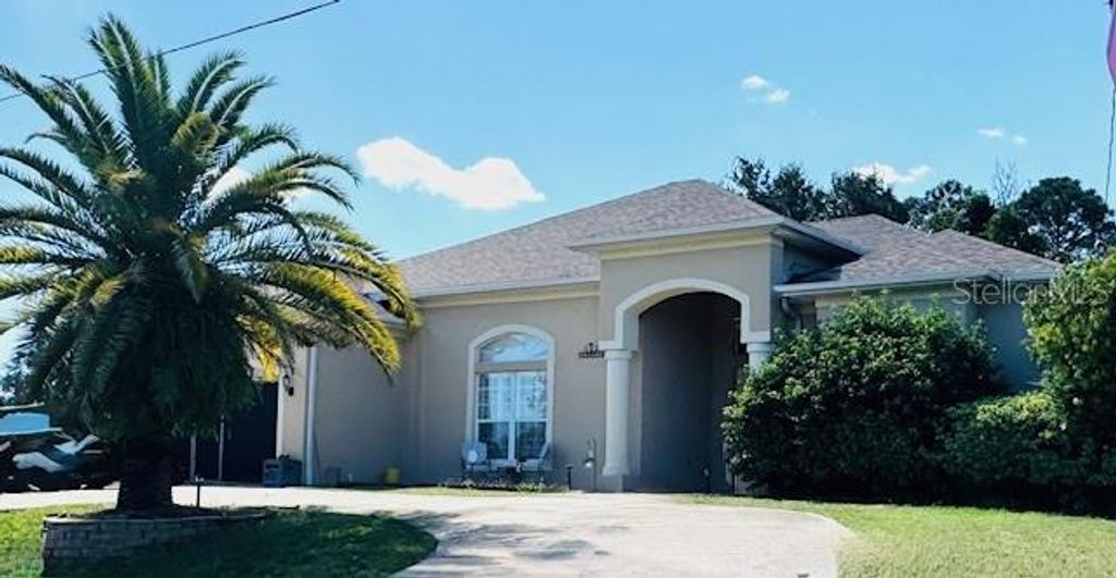Photo of 1 Woodbury Drive, Palm Coast, FL 32164 (MLS # FC313380)