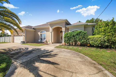 Photo of 1 Woodbury Drive, Palm Coast, FL 32164 (MLS # FC313380) Photo of 1 Woodbury Drive, Palm Coast, FL 32164 (MLS # FC313380)