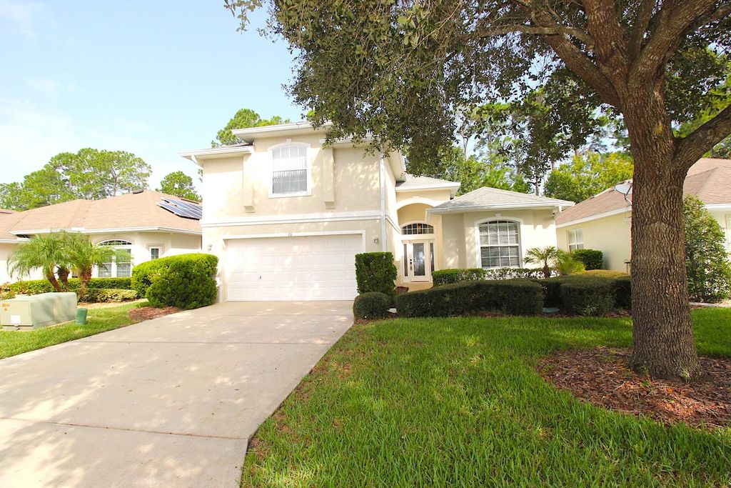 Photo of 60 Raintree Circle, Palm Coast, FL 32164 (MLS # FC314882)