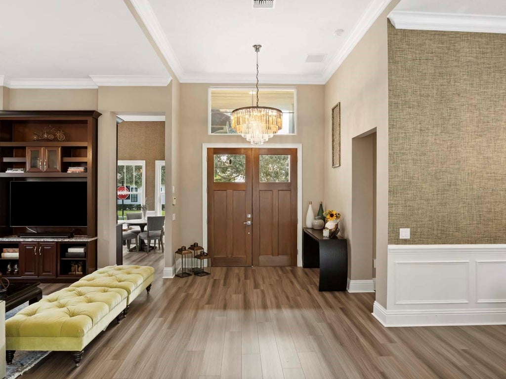 Photo of 8615 Farthington Way, Orlando, FL 32827 (MLS # O6448861)