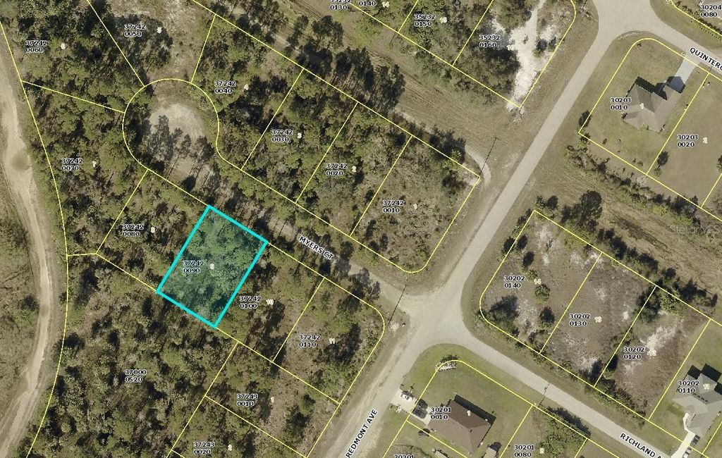 Photo of 605 Myers Court, Lehigh Acres, FL 33972 (MLS # OM710817)