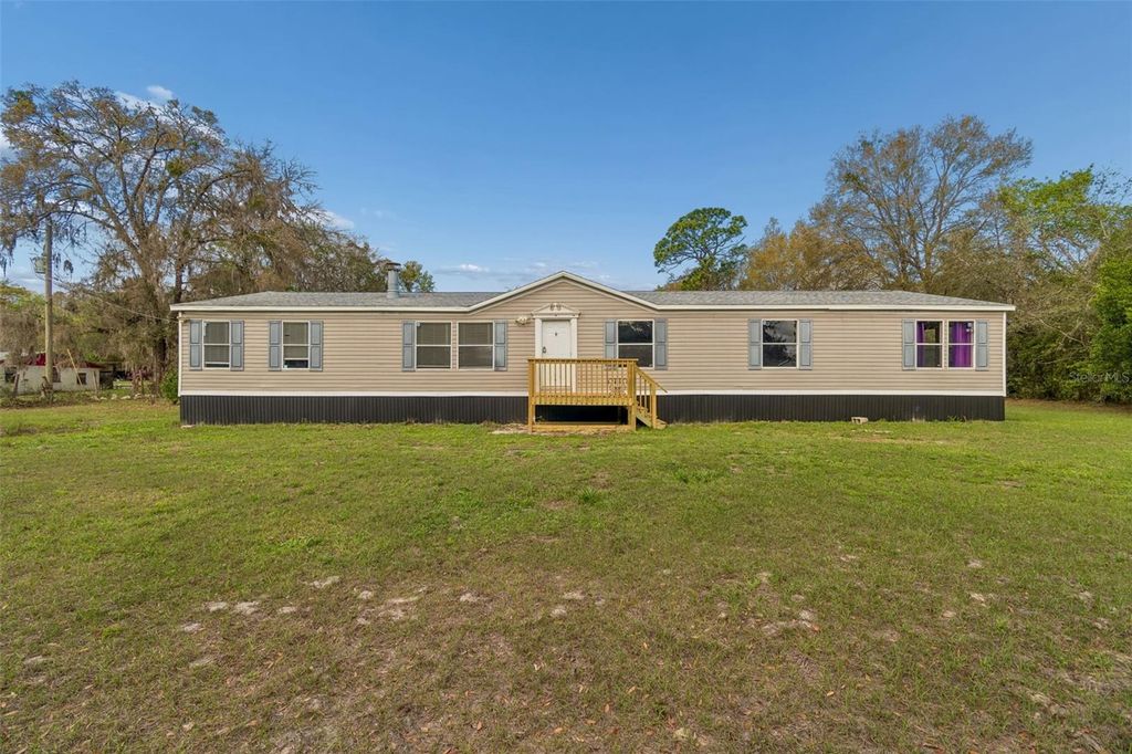 Photo of 18427 Moorhaven Drive, Spring Hill, FL 34610 (MLS # TB8485746)
