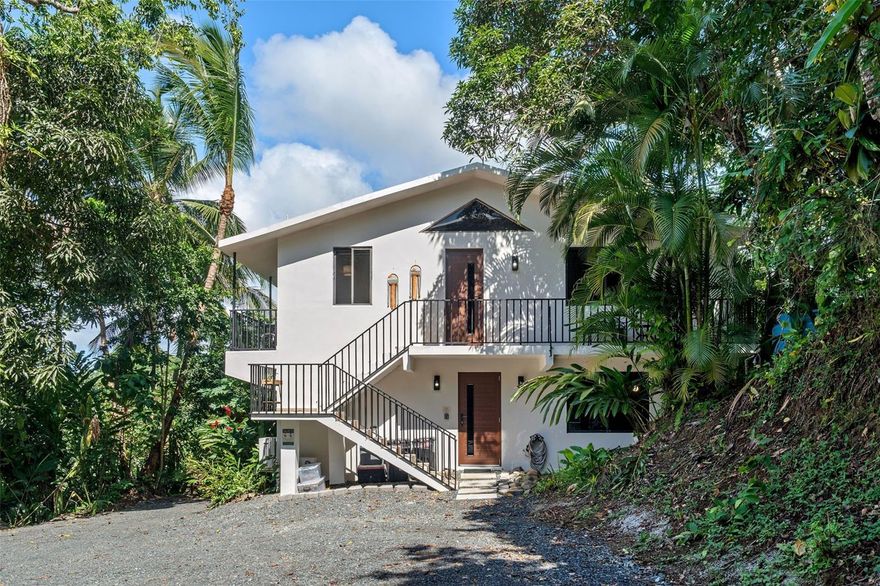 Rainforest Pearl is a beautifully remodeled and fully furnished 4-bedroom, 3-bath residence, set on nearly one cuerda of land just minutes from El Yunque. This private and tranquil home features a heated infinity pool, inverter air-conditioning throughout, and a 20KW generator for complete comfort and reliability. Designed for modern living with a tropical touch, the property offers easy access to main roads, top restaurants, hotels, and the island’s most iconic rainforest attractions. Recently launched as a short-term rental, Rainforest Pearl is being sold turn-key and fully equipped—ready to continue generating income from day one..