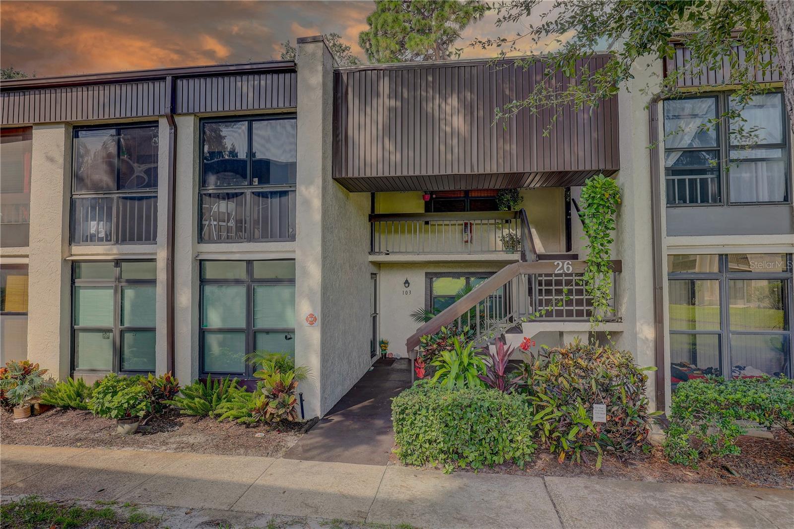 Welcome to 2400 Winding Creek Blvd #26-203 a picture-perfect penthouse-style retreat where comfort, charm, and leisure meet in the heart of a vibrant 55+ Adult community. If you’re ready to live like every day is a vacation, this completely furnished, sun-soaked 1-bedroom, 1-bath condo is your golden opportunity to turn the page and start the next exciting chapter of your life.
Perched on the top floor of a two story building with a walk-up design, this residence delivers all the low-maintenance benefits of condo living, while offering the serenity openness and privacy that comes with elevated living. As soon as you step inside, you’re welcomed by an airy open floor plan that flows effortlessly from room to room, creating a space that feels both expansive and cozy. Natural light spills through the windows, illuminating the warm, plush carpet underfoot in the living and bedroom areas, while vinyl and travertine tile finishes add a refined touch where it counts.
The heart of the home — the kitchen — boasts a functional layout with timeless appeal. Whether you're cooking for one or entertaining a few close friends, you'll appreciate the spacious counters, classic cabinetry, and built-in appliances, including a microwave, range, refrigerator, and dishwasher. Everything is right where it should be, giving you the ease and confidence to enjoy everyday living.
The generously-sized bedroom is your personal retreat, featuring a built-in closet’s and ample space for restful nights and relaxed mornings. But the charm doesn’t stop there. You’ll find bonus spaces like a cozy Florida Room and a bonus room that can double as an office, reading nook, or creative studio. There’s also an inside utility and laundry closet — conveniently located for your laundry / extra storage — giving you practicality without compromise.
Step outside to your private screened rear porch, an inviting spot to sip your morning coffee, read a book, or watch the palm trees sway against the backdrop of a lush garden/ courtyard view. You’ll love having a front-row seat to the serene, beautifully landscaped grounds — a calming retreat from the hustle of the world outside.
For those who enjoy a social lifestyle, the community delivers in every way. Dive into the sparkling community pool or unwind in the spa. Join your neighbors for a match on the tennis courts or head to the clubhouse for planned activities and recreation. Deeded, covered parking carport , along with guest spaces, means you’ll never worry about where to park, while the meticulously maintained common areas and exterior upkeep ensure everything stays as beautiful as the day you arrived.
This residence is designed with deed restrictions and maintenance services that make life effortless. From cable and insurance to landscaping and sewer — it’s all taken care of. All that’s left is for you to live your best life.
And let’s not forget this is a 55+ adult community, purposefully created for those who value lifestyle, ease, and connection. Whether you’re downsizing, relocating, or simply seeking a fresh start in a vibrant adult community, this condo is the kind of place that lets you slow down, breathe easy, and feel right at home from day one. Close to the world class beach’s and shopping and dining are right around the corner
2400 Winding Creek Blvd #26-203 isn’t just a condo, it’s a lifestyle. One that’s relaxed, secure, and full of possibility. Your turnkey dream home awaits.