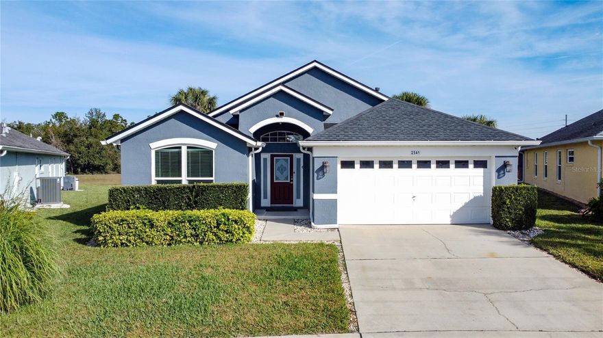 This beautifully maintained and thoughtfully upgraded Silver Springs model offers a rare combination of privacy, quality, and location, with a stunning conservation water view as its backdrop. Featuring four bedrooms and three bathrooms, including two spacious primary suites and a desirable split-bedroom floor plan, the home is offered fully furnished and has been carefully curated with attention to detail throughout. Perfect as a Short Term rental home, winter home or the "Move to Florida home" you've been dreaming of!
French doors open to a screened, heated pool and spa overlooking protected conservation, creating an inviting setting for relaxed afternoons or entertaining under the covered lanai on the expansive pool deck. The interior offers both an eat-in kitchen and a formal dining area, complemented by granite countertops, tile backsplash, and all appliances included. The living room has a stunning stone fireplace wall and this home has no carpet at all for easy maintenance. An inside laundry room with washer and dryer adds everyday convenience, while the insulated two-car garage and attic enhance energy efficiency. Significant improvements underscore the home’s value, including a new roof in 2022, new windows in 2020, exterior repainting in 2019, new blinds in 2022, updated toilets and sinks in 2018, a 2019 water heater, and security cameras installed in 2023. The pool & spa was resurfaced in 2023 with a saltwater system added the same year, complemented by solar pool heating installed in 2022 and pool automation added in 2025. Located just minutes from Disney, Margaritaville, Sunset Walk, H2O Water Park, shopping, dining, golf courses, and entertainment, this home truly delivers on location, lifestyle, and long-term value. With an optional HOA, it also presents an attractive opportunity for owners mindful of ongoing costs. A home that reflects genuine pride of ownership and offers exceptional value in one of Central Florida’s most sought-after areas.