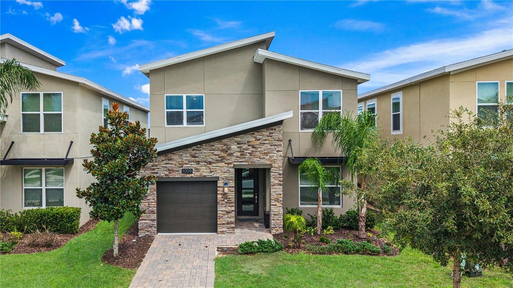 Photo of 1009 Leader St, Davenport, FL 33896 (MLS # O6447190)