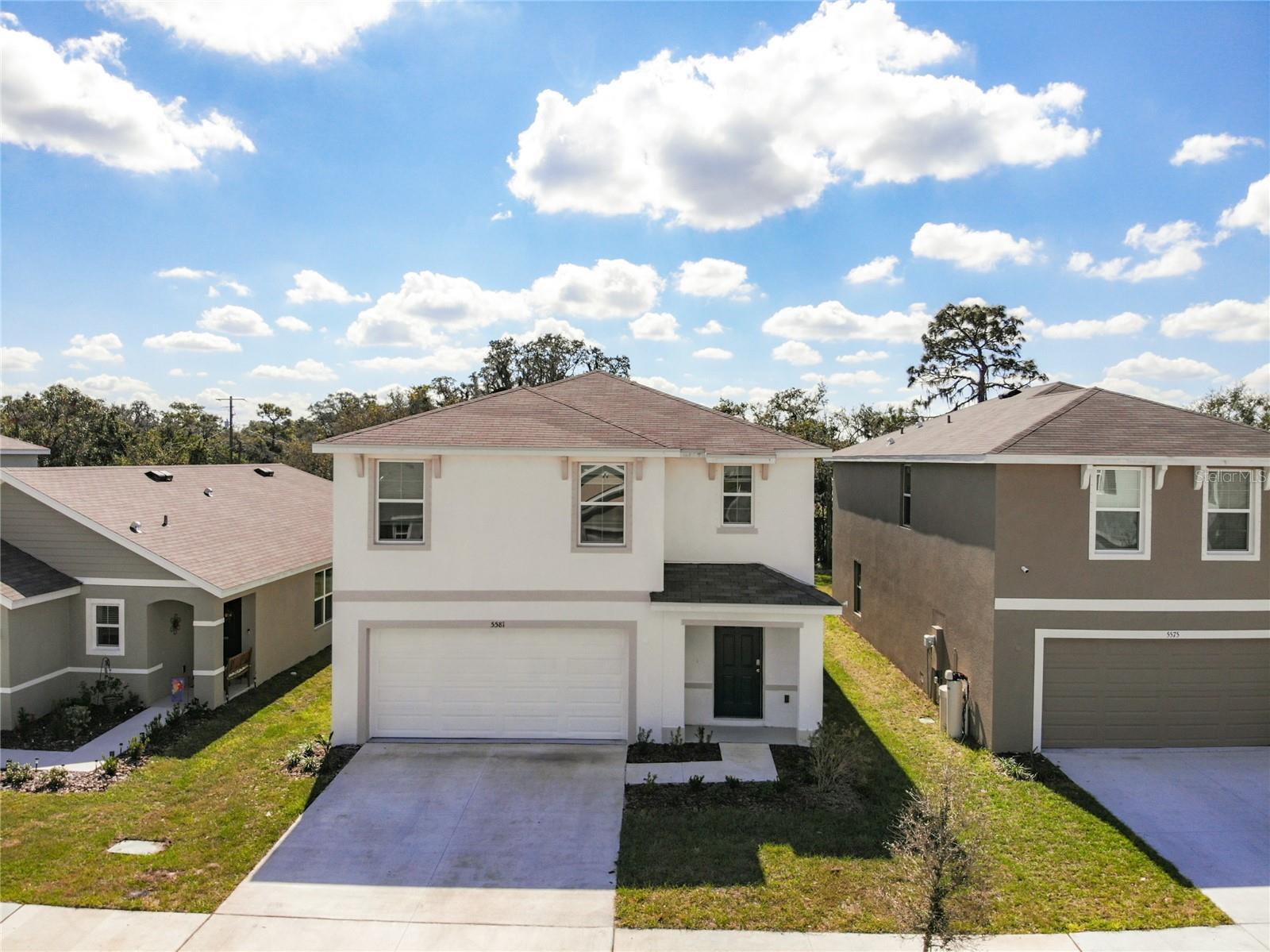 Welcome Home to resort like living in this sought after Creek Preserve community. This is the perfect commuter home being just minutes to the I75, and centrally located between downtown Tampa, St Pete, and Sarasota This is a popular model with 5 Bedrooms, 3 full baths, and a two-car garage. The first floor has 18x18" tiles throughout with lush carpet in the bedrooms and the second floor. The kitchen features brown shaker cabinets with granite countertops and stainless-steel appliances. The kitchen island is a chefs dream with a breakfast bar as the focal point of this open concept home. The main floor guest bedroom, bathroom, and walk in pantry are excellent for everyday living essentials. The living room / great room combo leads to the patio and fenced backyard. The second floor opens up to a loft with 4 great size bedrooms. The main bathroom has a double vanity with a soaking tub. The master suite boasts a large walk-in closet, with an ensuite that has a walk-in shower, and double vanity. Lots of natural sunlight with large windows on all sides. The community amenities include an open-air club house, pool, playground, walking trails, and basketball court. Centrally located near shopping like Walmart, Aldi, schools, and parks like EG Simmons park, Little Manatee state park and more.