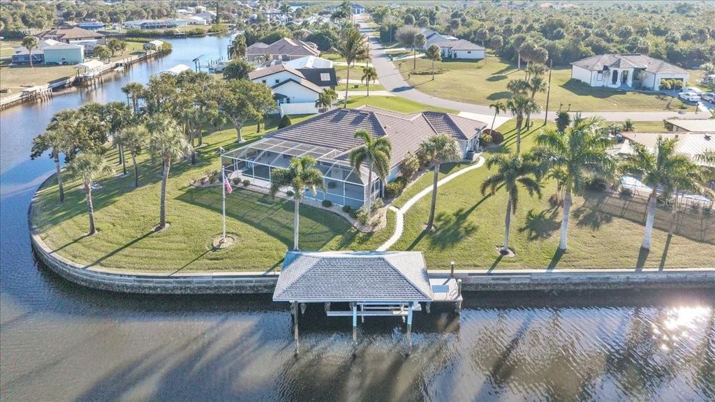 Photo of 18694 Macgill Avenue, Port Charlotte, FL 33948 (MLS # C7521171)