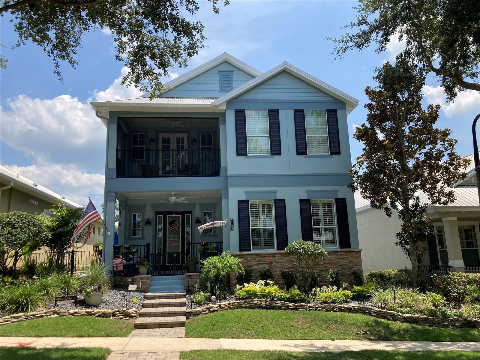 Outdoor living without maintenance. This beautiful home in Etowah offers a second-floor screened front porch, a first-floor screened porch, and a paved driveway and walkway. Your meticulously updated home features quartz counters, a custom laundry room, and more. A must-see!