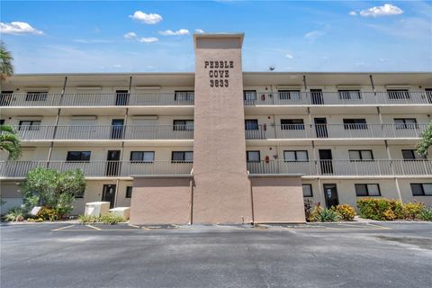Photo of 3833 S Banana River Boulevard #303, Cocoa Beach, FL 32931 (MLS # O6346429)