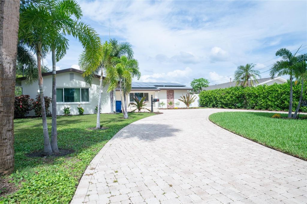 Photo of 5119 Venetian Boulevard NE, St Petersburg, FL 33703 (MLS # TB8436037)