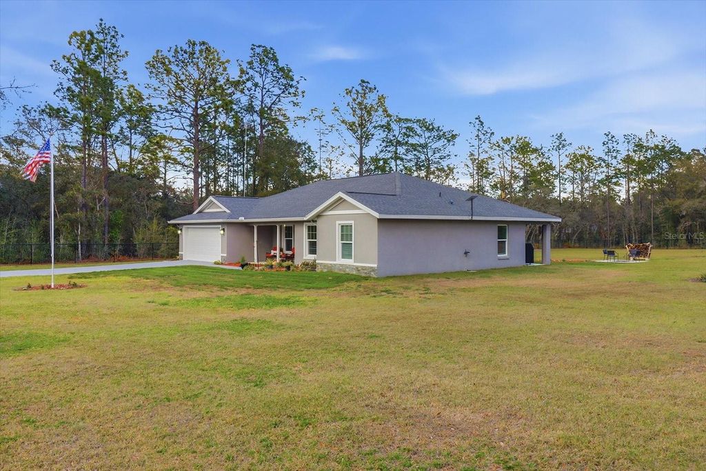 Photo of 8199 SW 129th Terrace Road, Dunnellon, FL 34432 (MLS # O6388169)