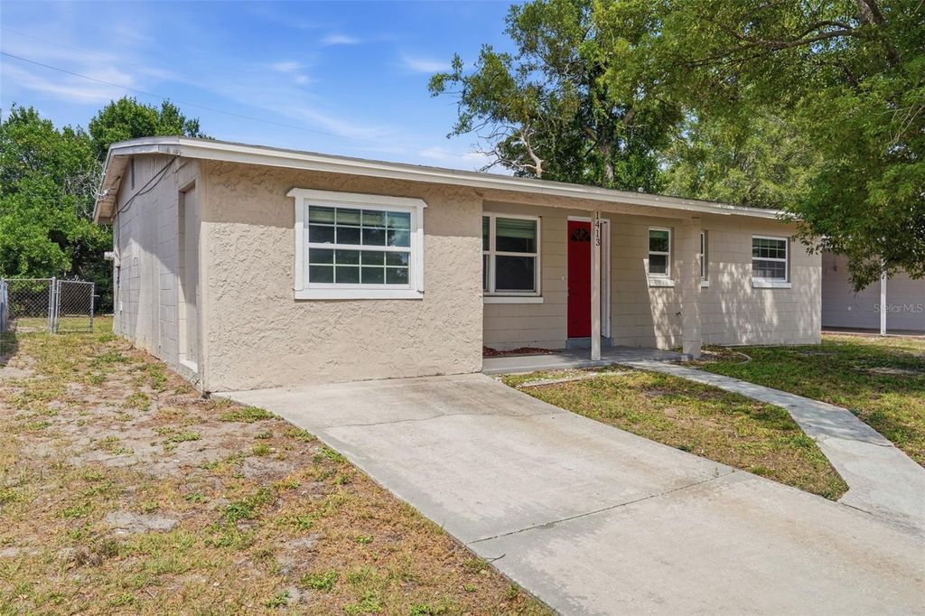 Photo of 1413 Sunridge Road, Orlando, FL 32808 (MLS # O6404864)