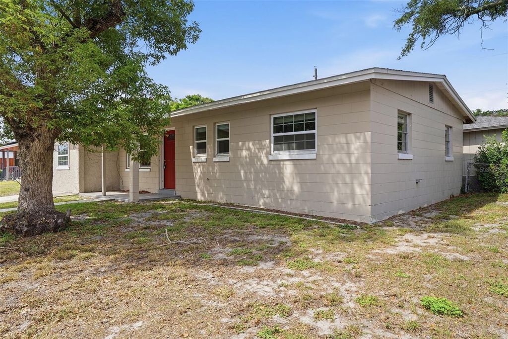 Photo of 1413 Sunridge Road, Orlando, FL 32808 (MLS # O6404864)