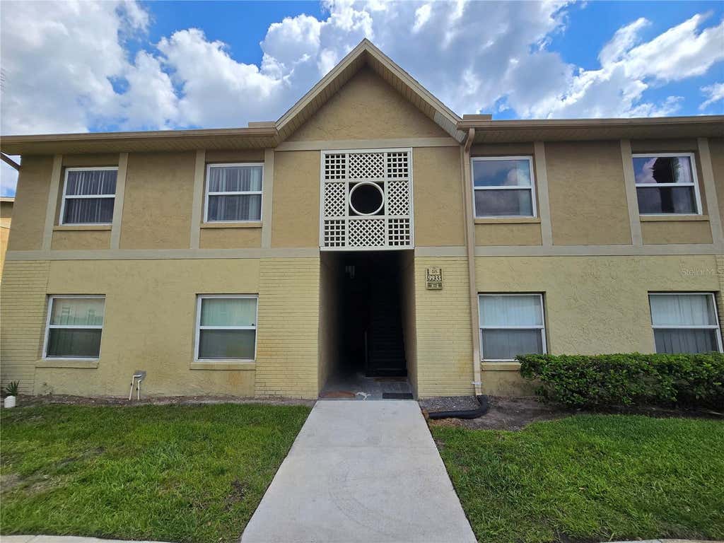 Photo of 9933 Sweepstakes Lane #4, Orlando, FL 32837 (MLS # O6414118)