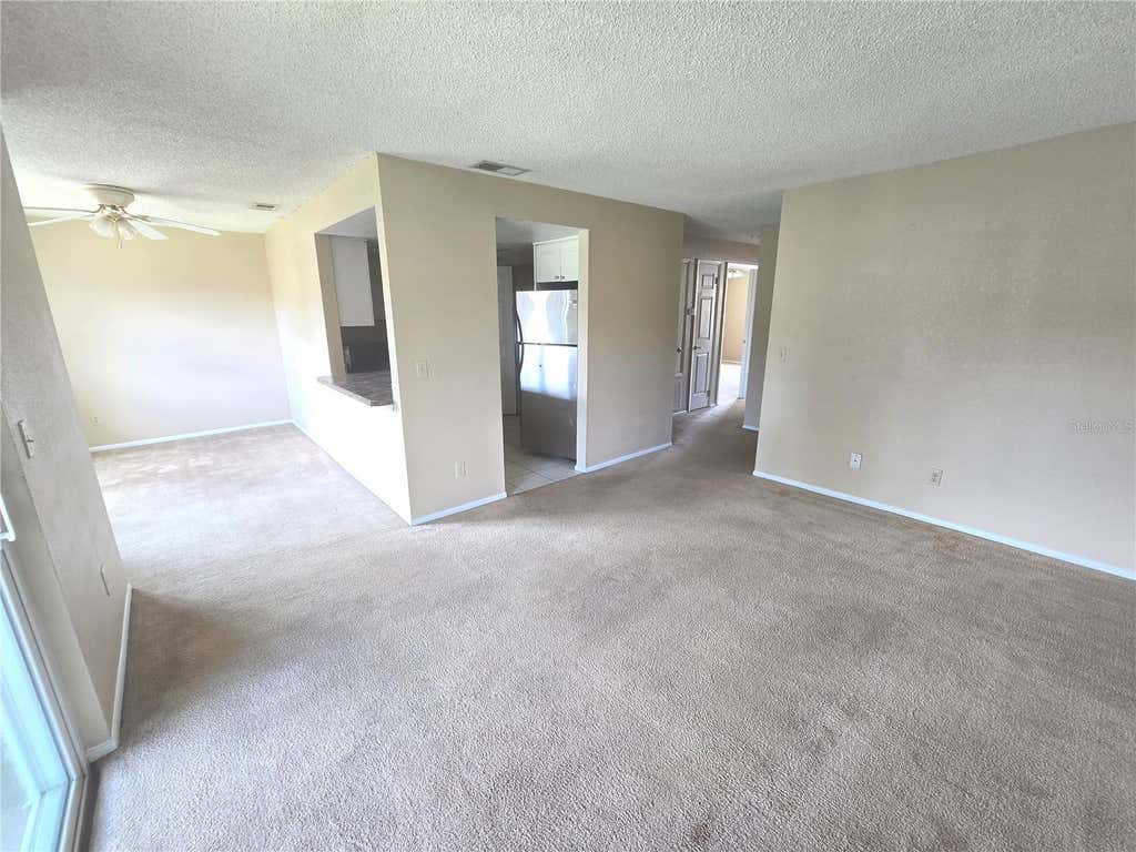 Photo of 9933 Sweepstakes Lane #4, Orlando, FL 32837 (MLS # O6414118)