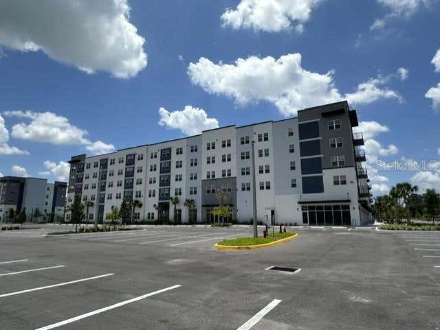 Photo of 5563 Millenia Park Boulevard #508, Orlando, FL 32839 (MLS # O6427616)