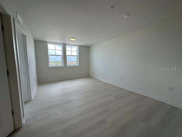 Photo of 5563 Millenia Park Boulevard #508, Orlando, FL 32839 (MLS # O6427616)