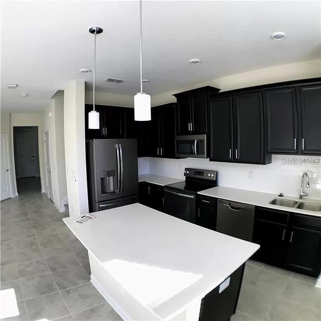 Photo of 4652 Tribute Trail, Kissimmee, FL 34746 (MLS # O6383425)