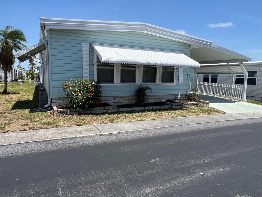 Photo of 832 Cane Palm Street, Largo, FL 33778 (MLS # TB8387496)