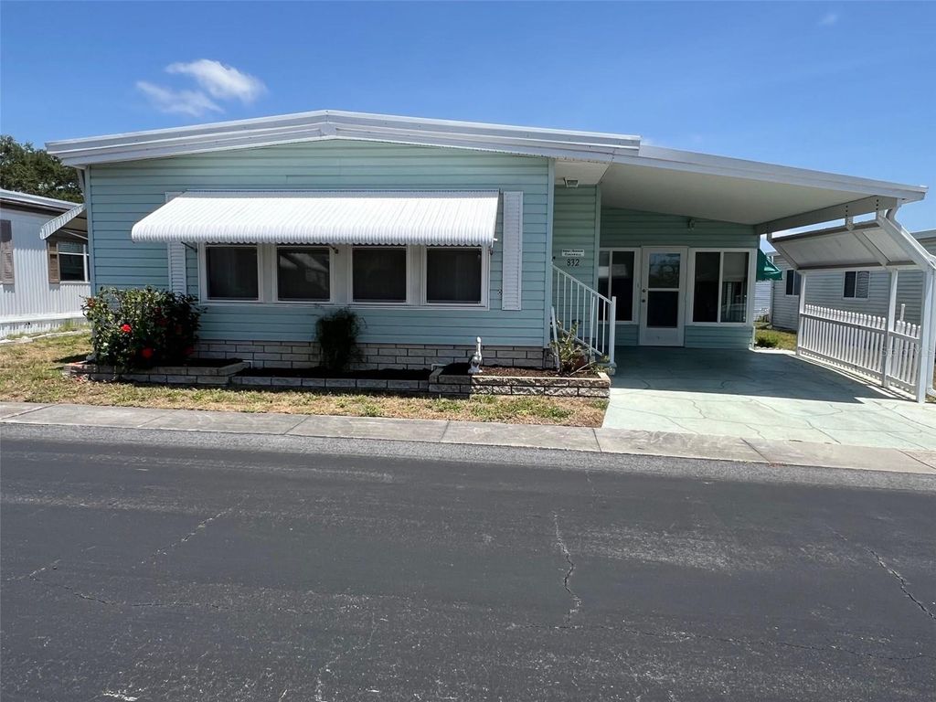 Photo of 832 Cane Palm Street, Largo, FL 33778 (MLS # TB8387496)