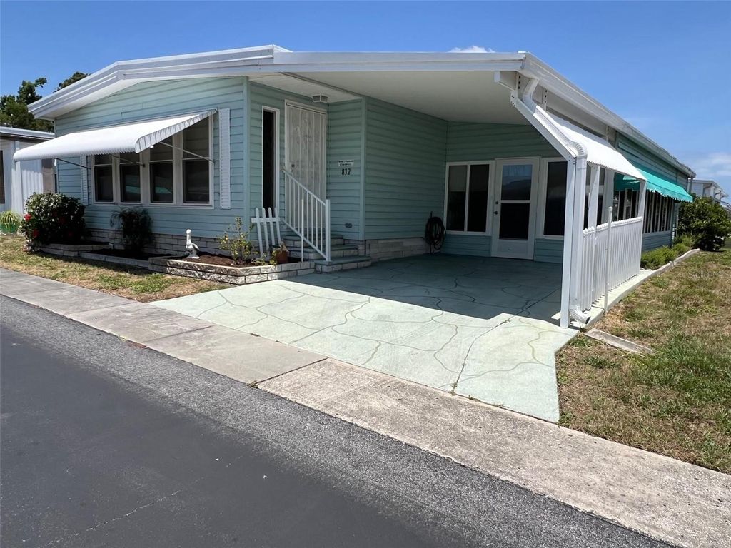 Photo of 832 Cane Palm Street, Largo, FL 33778 (MLS # TB8387496)