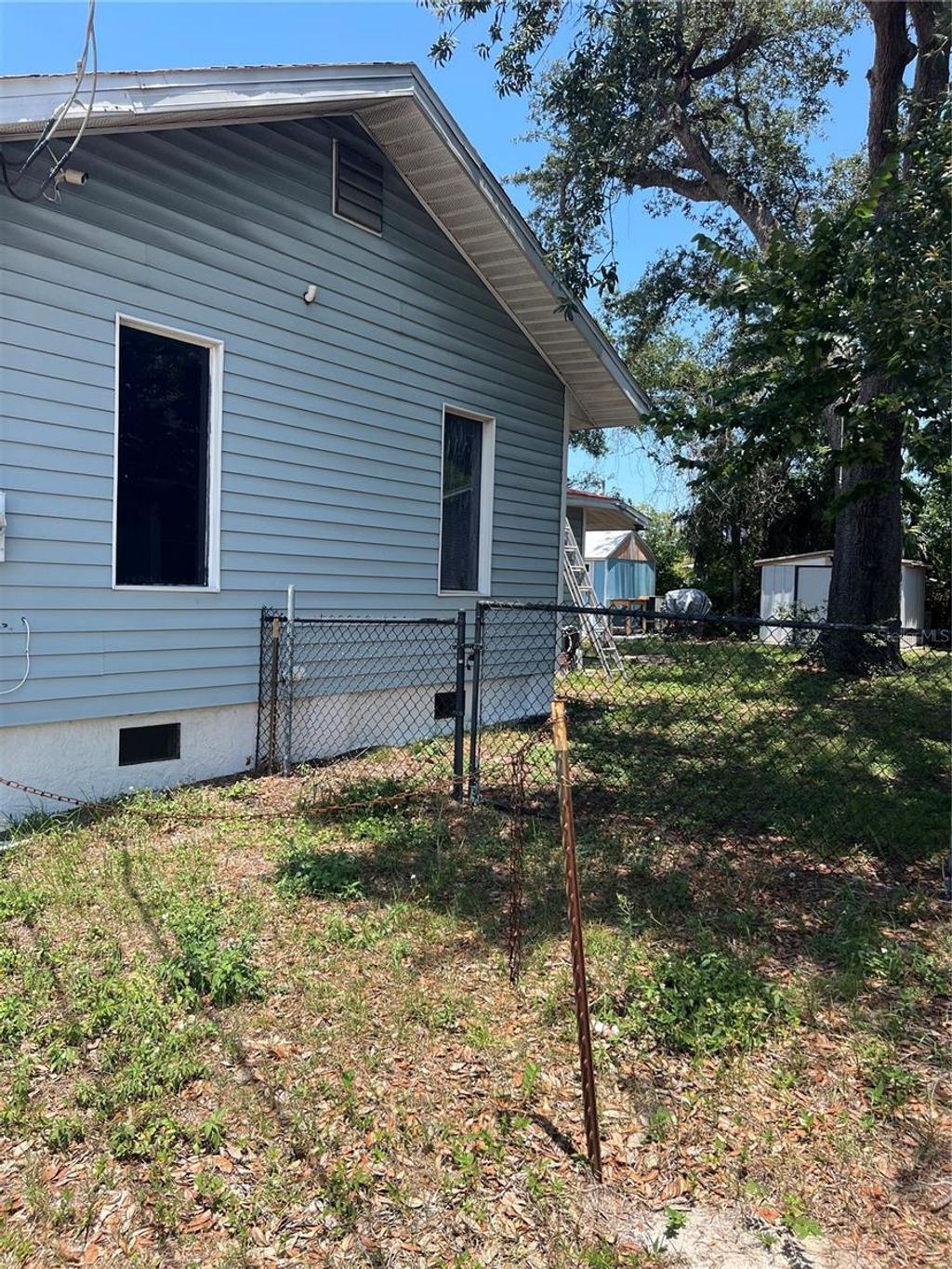 Photo of 825 N Ridgewood Avenue, Daytona Beach, FL 32114 (MLS # O6318598)